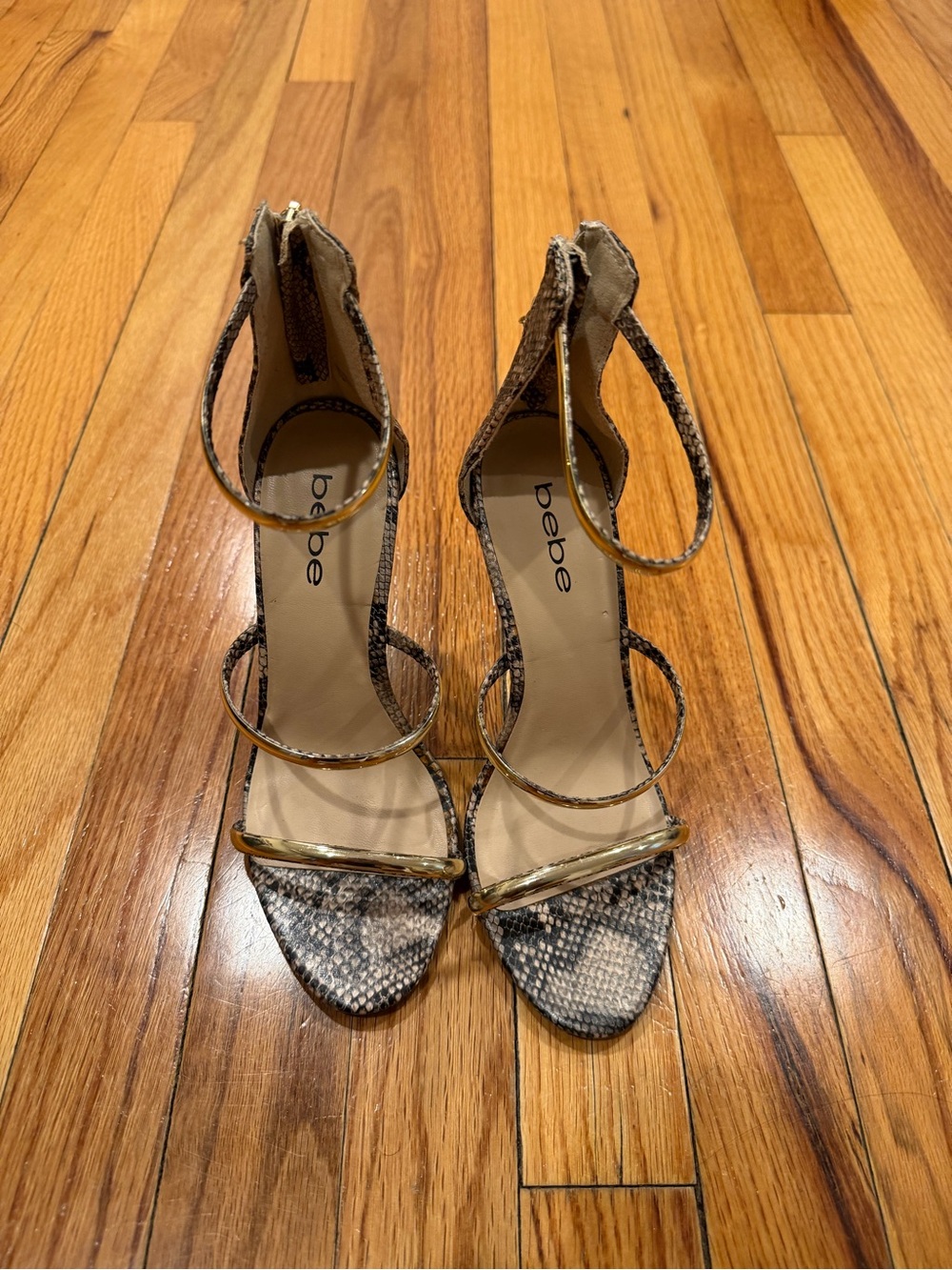 bebe Snake-Print Strappy Heels in Taupe with Gold Accents
